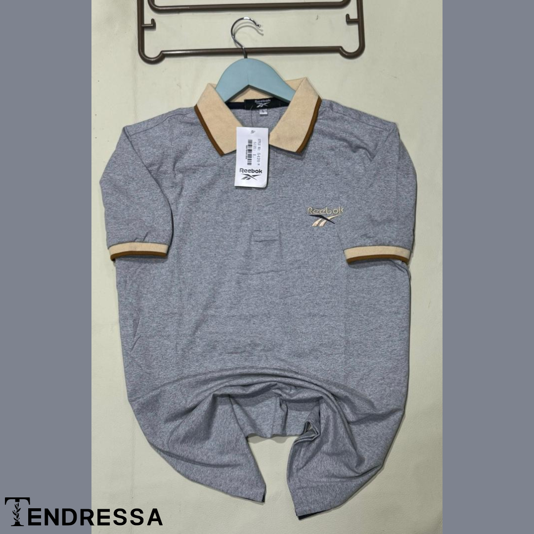 Élégance Subtile: Polo Gris avec Col et Manches Marron, Luxe et Confort Inégalés