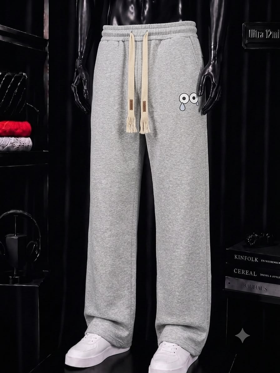 Pantalon jogging gris motif regard