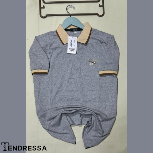 Élégance Subtile: Polo Gris avec Col et Manches Marron, Luxe et Confort Inégalés