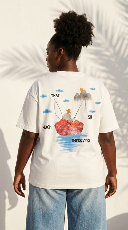T-shirt oversize pêcheur blanc porté, dos avec dessin barque