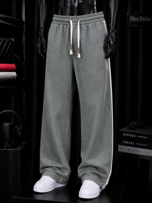 Pantalon large délavé à bandes latérales