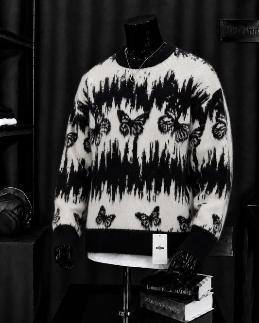 Pull jacquard papillons noir blanc