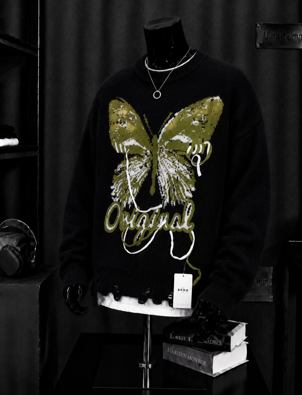 Pull noir papillon Original effiloché