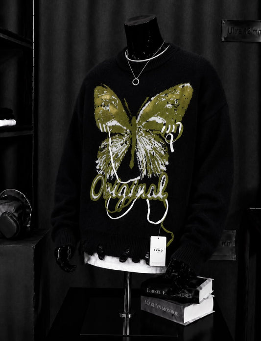 Pull noir papillon Original effiloché