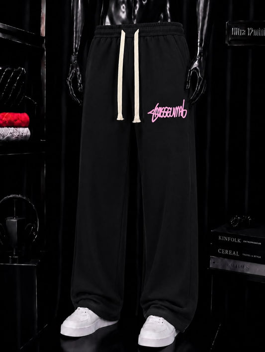 Pantalon jogging noir graffiti rose