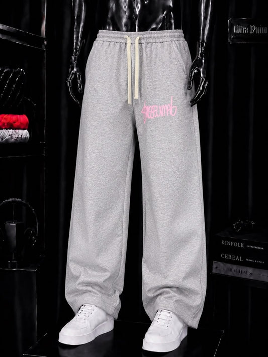 Pantalon jogging gris graffiti rose