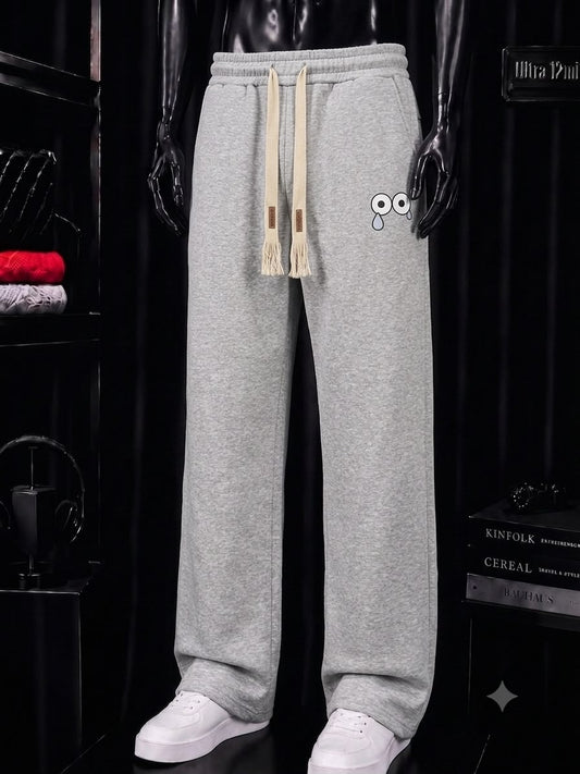 Pantalon jogging gris motif regard