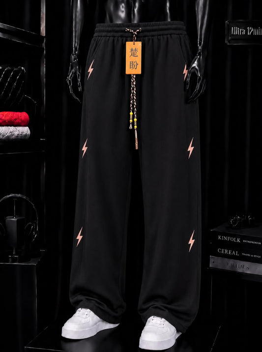 Pantalon jogging noir éclairs corail