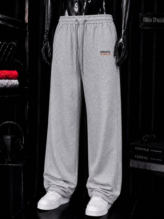 Pantalon jogging gris lettrage orange