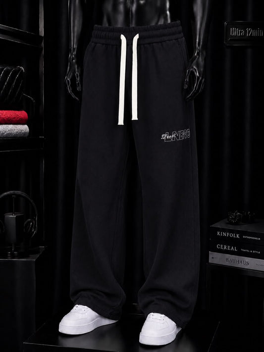 Pantalon jogging noir lettrage contour