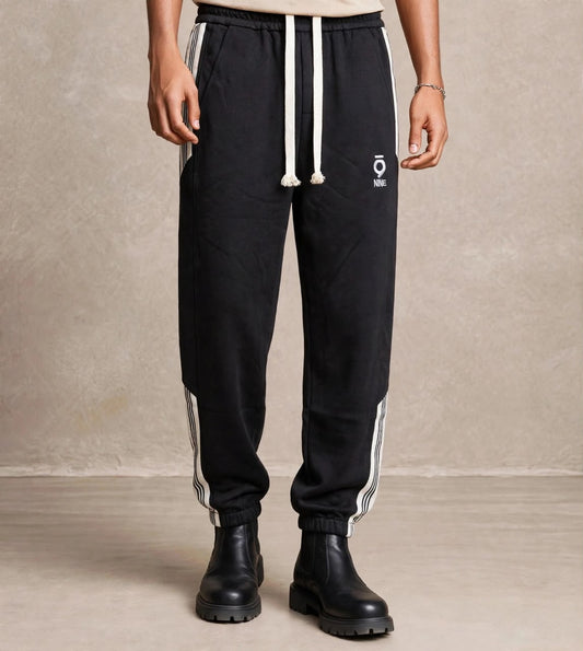 Pantalon jogging noir bandes blanches