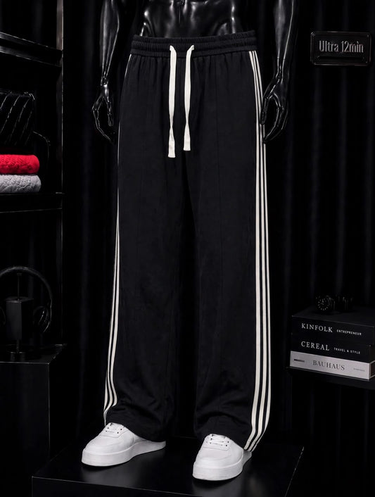 Pantalon large noir triple bande blanche