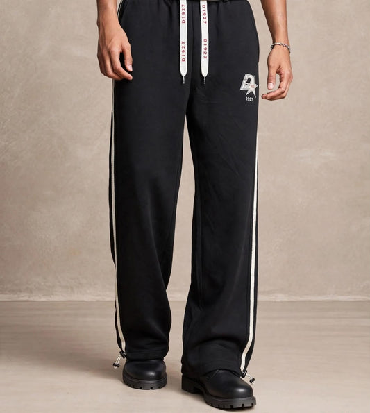 Pantalon large noir bande étoile