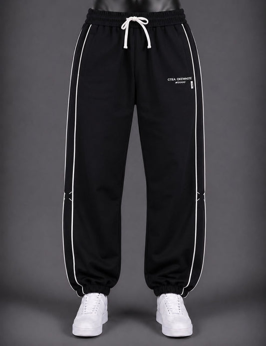 Pantalon large noir liseré blanc