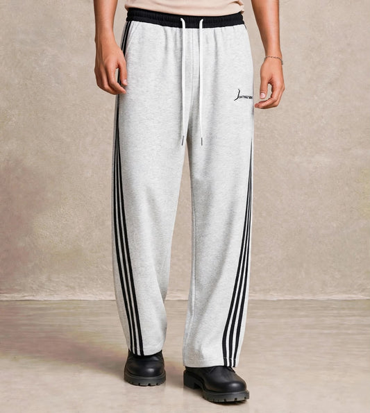 Pantalon jogging gris trois bandes noires latérales — Tendressa