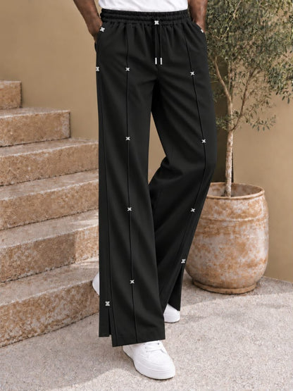 Pantalon large à nervures et attaches métalliques