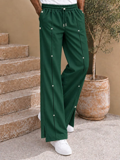 Pantalon large à nervures et attaches métalliques