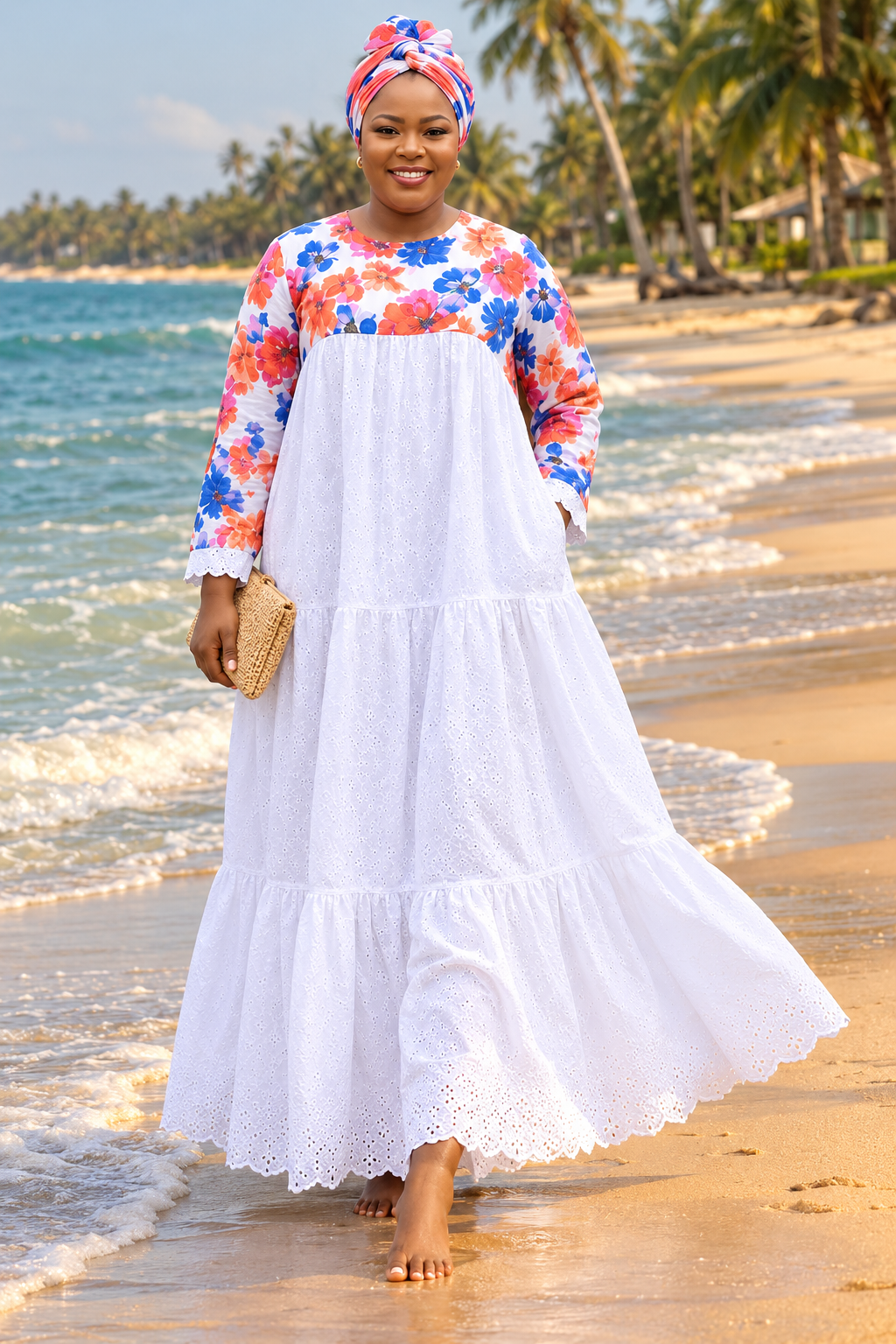 Robe longue blanche à buste fleuri portée à la plage